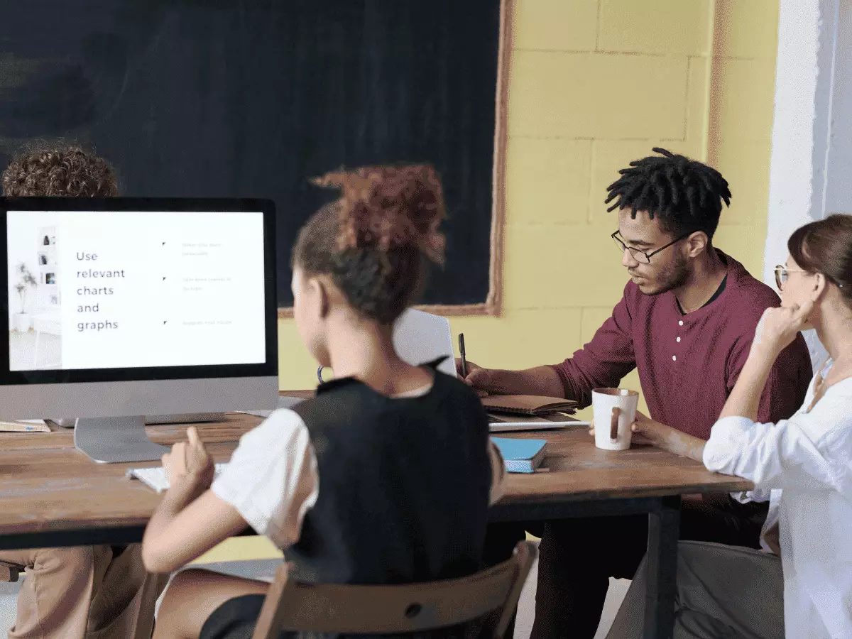 Developers working together on business software